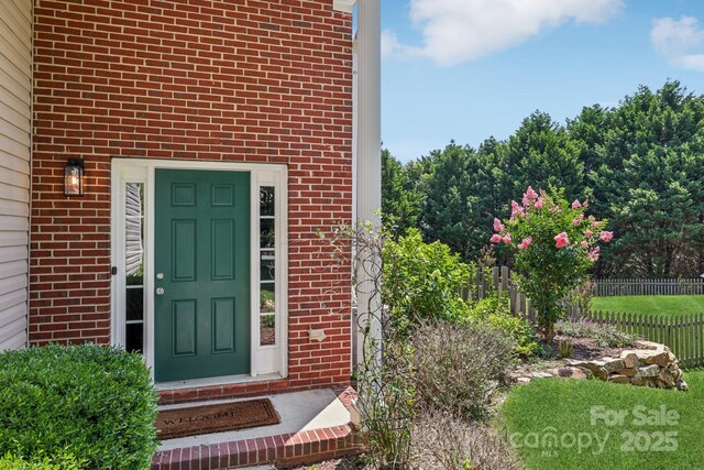 1986 Trace Creek Dr, Waxhaw, NC 28173 - doorway to property featuring brick siding
