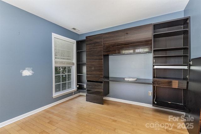 2001 Enderbury Dr, Indian Trail, NC 28079 - unfurnished bedroom featuring hardwood / wood-style floors