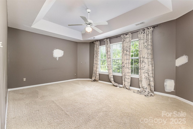 2001 Enderbury Dr, Indian Trail, NC 28079 - carpeted empty room featuring a tray ceiling and a ceiling fan
