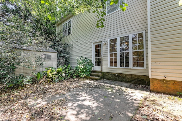 2001 Enderbury Dr, Indian Trail, NC 28079 - back of property featuring entry steps and a patio area