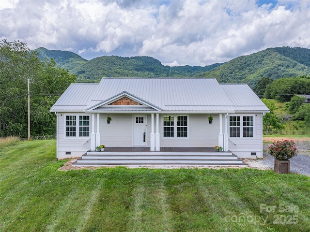 3355 Thickety Rd, Clyde, NC 28721 - view of front of house with crawl space, a mountain view, and a front lawn