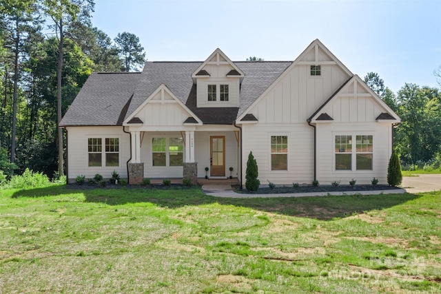 8680 Sherrills Ford Rd, Sherrills Ford, NC 28673 - view of front of property featuring board and batten siding, a shingled roof, and a front lawn