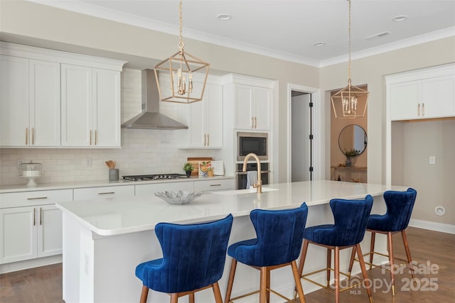 8680 Sherrills Ford Rd, Sherrills Ford, NC 28673 - kitchen with wall chimney exhaust hood, a chandelier, dark wood-style floors, tasteful backsplash, and stainless steel appliances