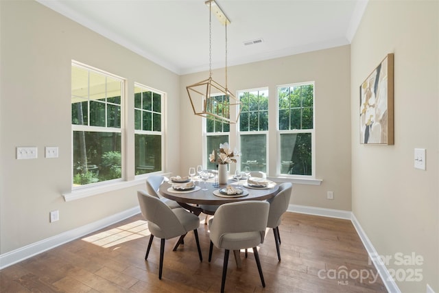 8680 Sherrills Ford Rd, Sherrills Ford, NC 28673 - dining space featuring hardwood / wood-style flooring and ornamental molding