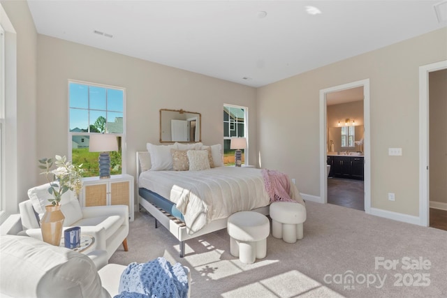 8680 Sherrills Ford Rd, Sherrills Ford, NC 28673 - carpeted bedroom featuring baseboards and ensuite bath