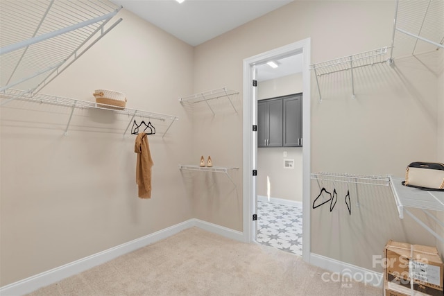 8680 Sherrills Ford Rd, Sherrills Ford, NC 28673 - walk in closet featuring light carpet and light floors