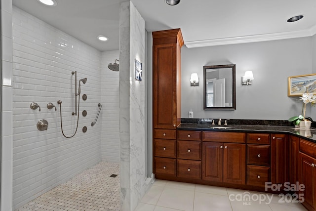 104 Overlook Dr, Flat Rock, NC 28731 - bathroom with ornamental molding, a tile shower, vanity, and recessed lighting