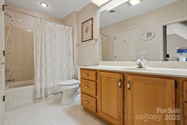104 Overlook Dr, Flat Rock, NC 28731 - bathroom with wallpapered walls, vanity, shower / bath combo, and tile patterned flooring