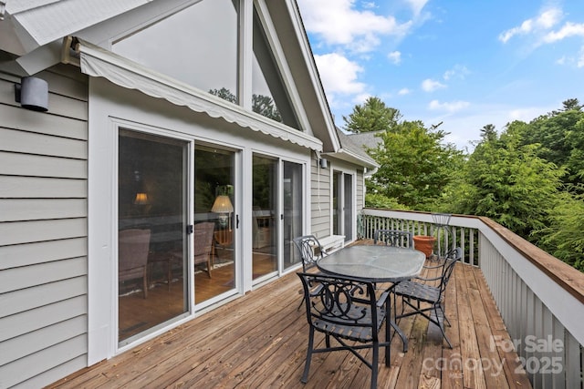 104 Overlook Dr, Flat Rock, NC 28731 - wooden deck featuring outdoor dining area