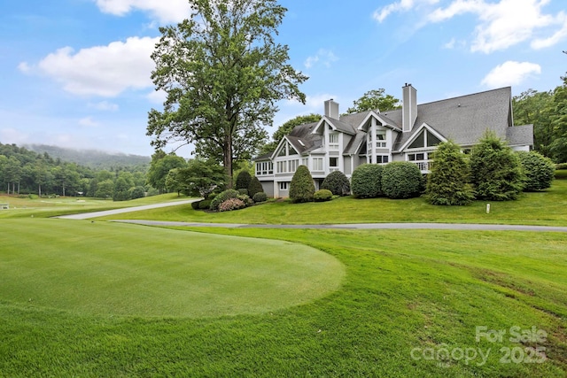 104 Overlook Dr, Flat Rock, NC 28731 - view of property's community with golf course view and a yard