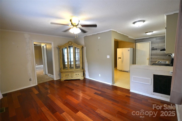 416 E Union St, Marshville, NC 28103 - spare room featuring wood finished floors, a ceiling fan, and ornamental molding