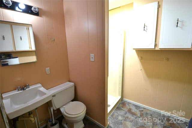 416 E Union St, Marshville, NC 28103 - bathroom featuring stone finish flooring and a shower stall