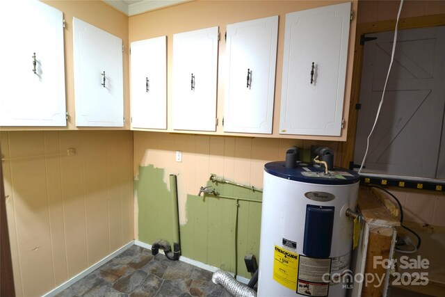 416 E Union St, Marshville, NC 28103 - utility room featuring electric water heater and electric panel
