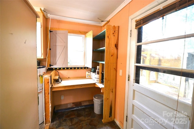 416 E Union St, Marshville, NC 28103 - interior space with healthy amount of natural light, dark stone finish flooring, and crown molding