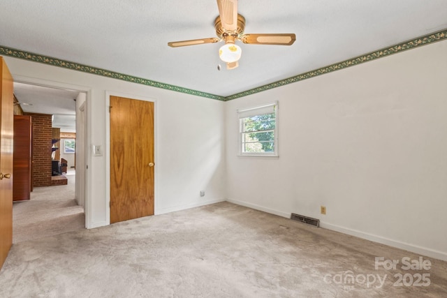 128 Howie St, Mount Holly, NC 28120 - unfurnished bedroom with carpet and ceiling fan