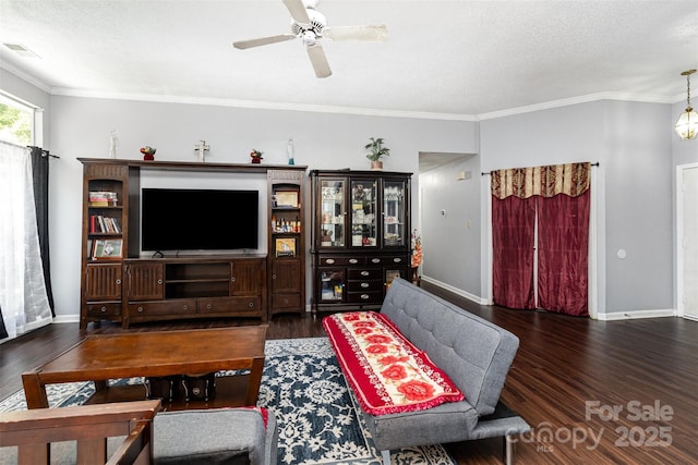 9520 Marshbrooke Rd, Matthews, NC 28105 - living room featuring wood finished floors, a ceiling fan, ornamental molding, and a textured ceiling