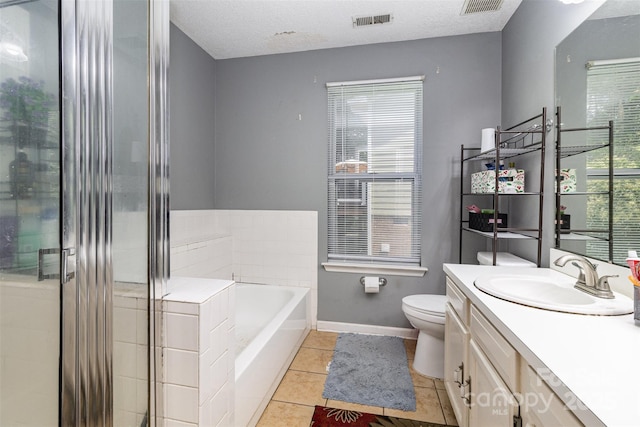 9520 Marshbrooke Rd, Matthews, NC 28105 - full bath featuring vanity, a bath, tile patterned floors, a stall shower, and a textured ceiling