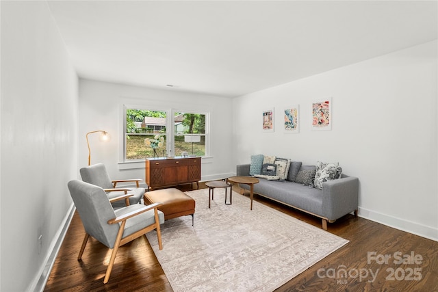 5320 Kildare Dr, Charlotte, NC 28215 - living area with dark wood finished floors