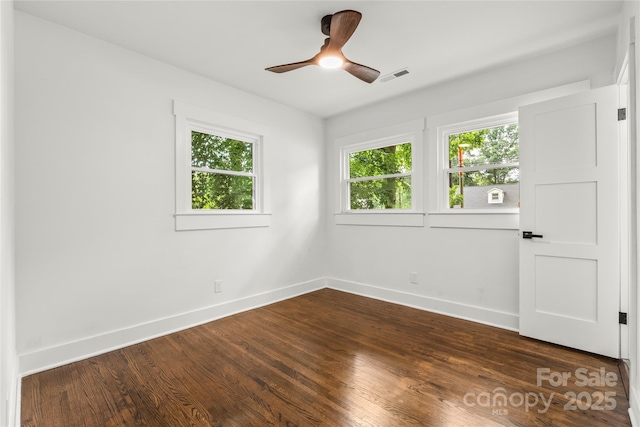 5320 Kildare Dr, Charlotte, NC 28215 - unfurnished room with dark wood-type flooring and a ceiling fan