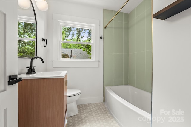 5320 Kildare Dr, Charlotte, NC 28215 - bathroom featuring vanity, washtub / shower combination, and tile patterned floors