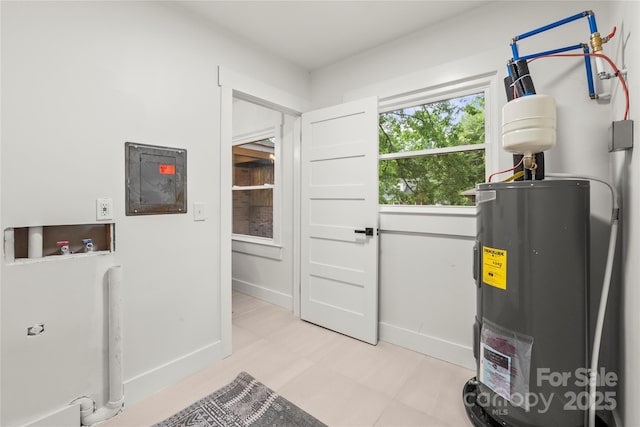 5320 Kildare Dr, Charlotte, NC 28215 - utility room with water heater