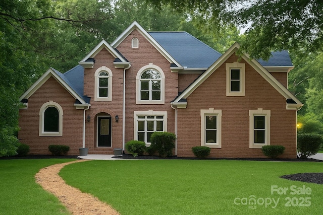 3011 Mckee Rd, Charlotte, NC 28270 - view of front of house with a front lawn and brick siding