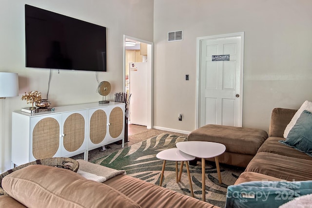 5922 Sullins Rd, Charlotte, NC 28214 - living room featuring carpet flooring and baseboards