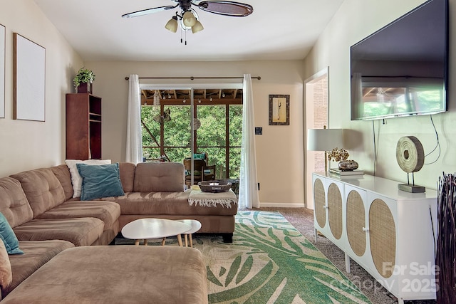 5922 Sullins Rd, Charlotte, NC 28214 - carpeted living room featuring ceiling fan and baseboards