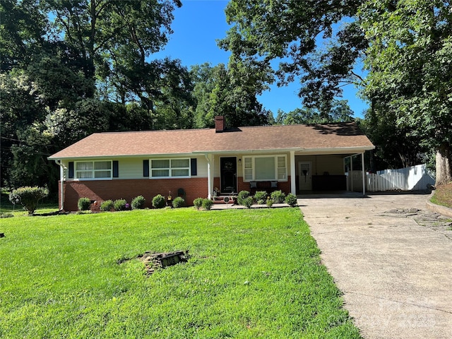 708 E St Unit 8, 9, Albemarle, NC 28001 - ranch-style home featuring brick siding, a chimney, concrete driveway, and a carport