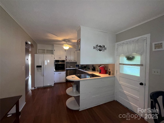 708 E St Unit 8, 9, Albemarle, NC 28001 - kitchen featuring white refrigerator with ice dispenser, oven, dark wood-type flooring, a peninsula, and crown molding
