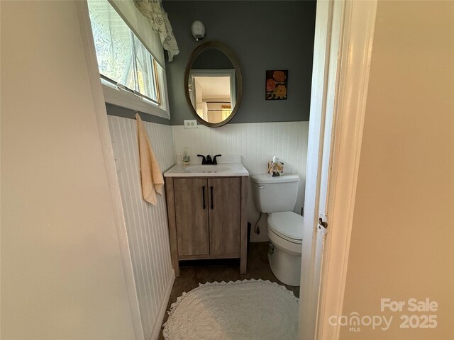 708 E St Unit 8, 9, Albemarle, NC 28001 - half bathroom featuring vanity and a wainscoted wall