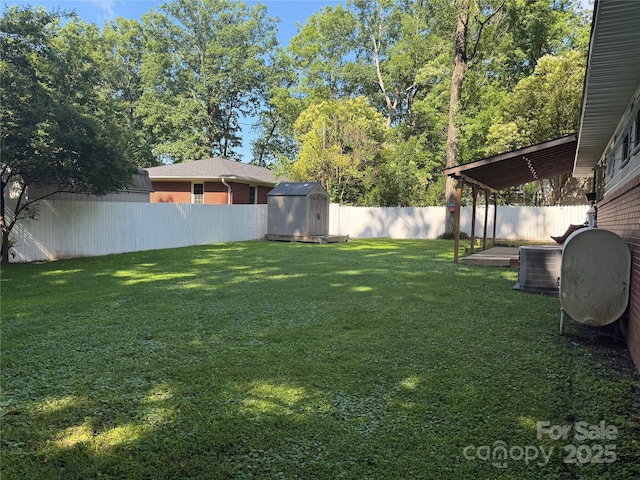 708 E St Unit 8, 9, Albemarle, NC 28001 - fenced backyard with a storage unit