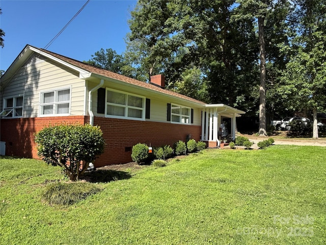708 E St Unit 8, 9, Albemarle, NC 28001 - single story home featuring brick siding, a chimney, a front yard, and crawl space