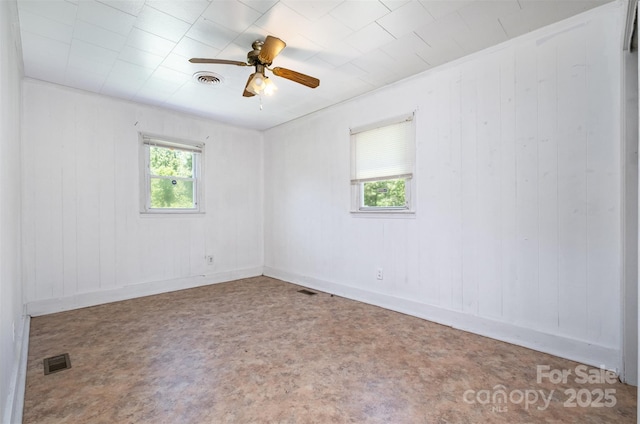 1043 Sid Davis Rd, Chester, SC 29706 - unfurnished room featuring ceiling fan and wooden walls