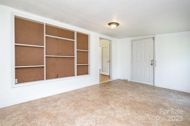 1043 Sid Davis Rd, Chester, SC 29706 - spare room featuring a textured ceiling