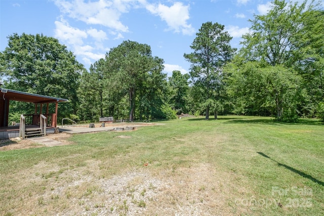 1043 Sid Davis Rd, Chester, SC 29706 - view of green lawn featuring a wooden deck