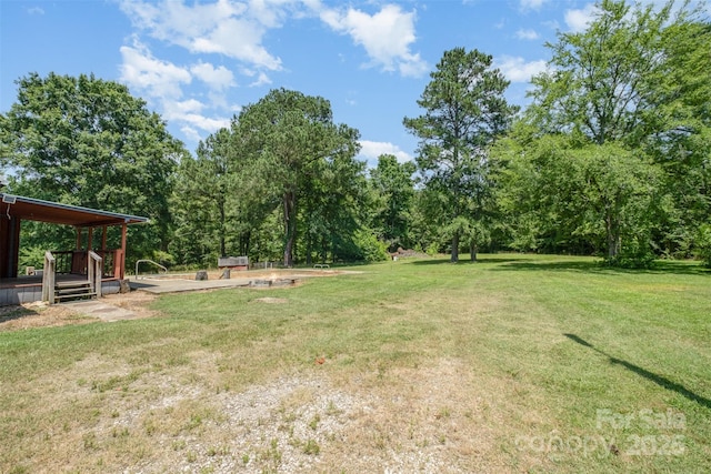 1043 Sid Davis Rd, Chester, SC 29706 - view of green lawn featuring a wooden deck