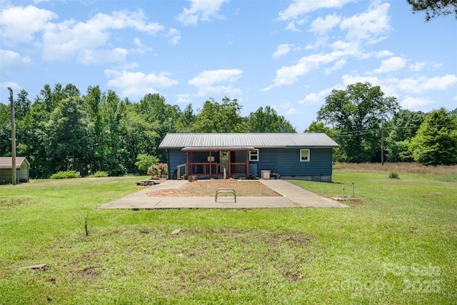 1043 Sid Davis Rd, Chester, SC 29706 - rear view of house featuring a yard and a metal roof