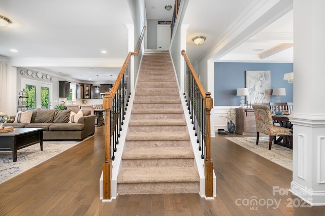 183 Canoe Pole Ln, Mooresville, NC 28117 - staircase featuring ornamental molding, wood finished floors, and wainscoting