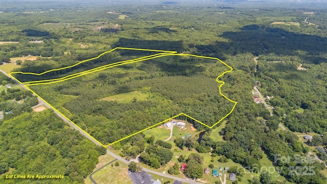 5623 Walters Mill Rd, Providence, NC 27315 - aerial view of property's location with a heavily wooded area and property parcel outlined