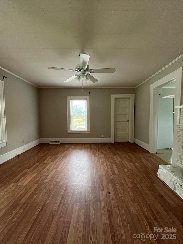 628 Main St S, Jonesville, NC 29353 - spare room featuring ornamental molding, wood finished floors, and a ceiling fan