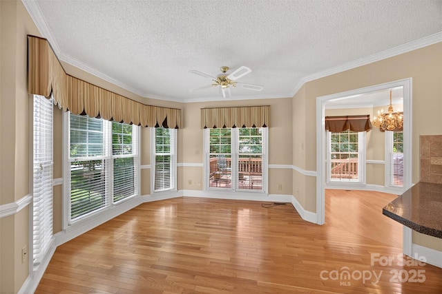 803 Woodmoore Ln, Kannapolis, NC 28081 - unfurnished sunroom featuring plenty of natural light and a chandelier