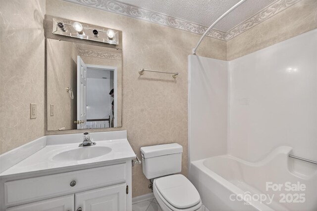 803 Woodmoore Ln, Kannapolis, NC 28081 - full bath featuring tub / shower combination, vanity, and a textured ceiling