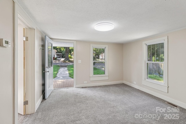 1626 W Park Ave, Albemarle, NC 28001 - carpeted empty room featuring a textured ceiling and baseboards
