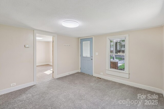 1626 W Park Ave, Albemarle, NC 28001 - carpeted empty room with a textured ceiling and baseboards