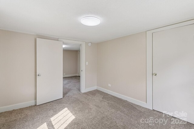 1626 W Park Ave, Albemarle, NC 28001 - empty room with light carpet and baseboards