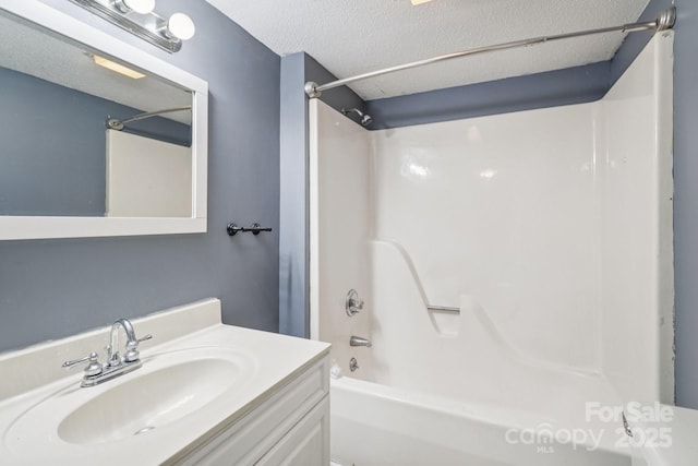 1626 W Park Ave, Albemarle, NC 28001 - full bath featuring shower / bathtub combination, vanity, and a textured ceiling