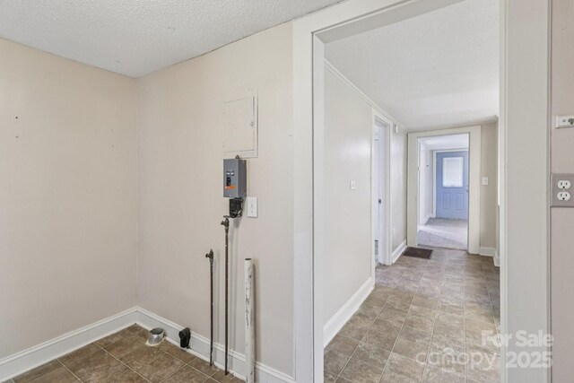 1626 W Park Ave, Albemarle, NC 28001 - corridor with baseboards and a textured ceiling