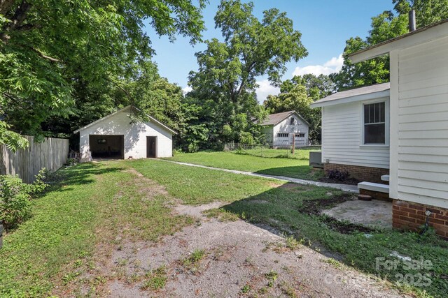 1626 W Park Ave, Albemarle, NC 28001 - view of yard with an outbuilding and a garage