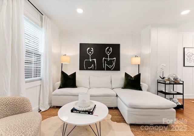 504 Wakefield Dr Unit A, Charlotte, NC 28209 - living area with a decorative wall, wood finished floors, and recessed lighting